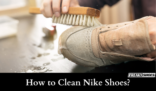 Freaky Shoes® custom art sneakers being cleaned with brush, showcasing care for wearable art made to order.