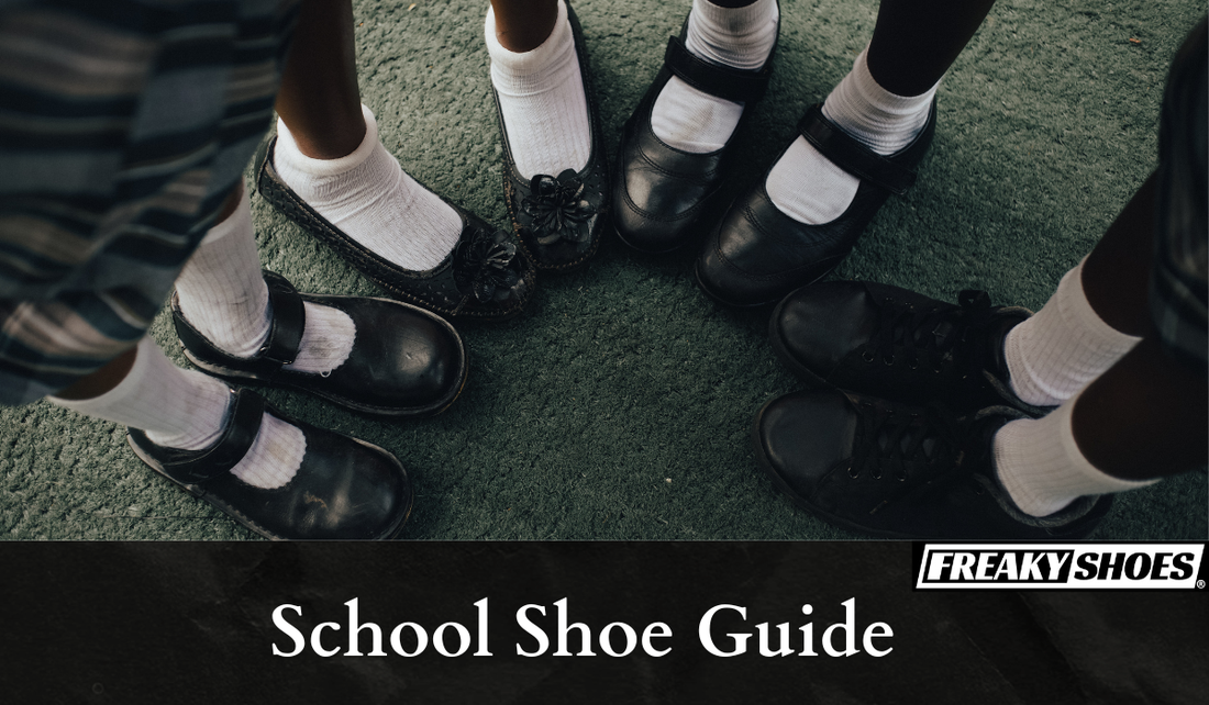 Freaky Shoes® custom art sneakers: black Mary Jane & lace-up school shoes with white socks on green turf