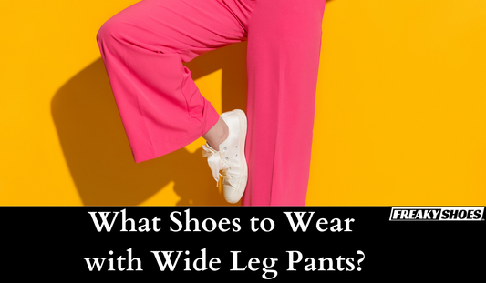 Freaky Shoes custom art sneakers with white low-top design, styled with pink wide-leg pants against yellow background