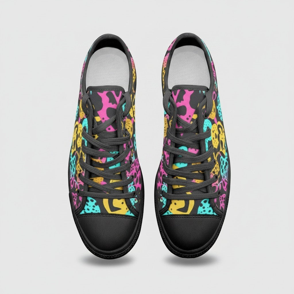Freaky Shoes® high-top canvas sneakers featuring a vibrant, multi-colored animal print pattern on a black background.
