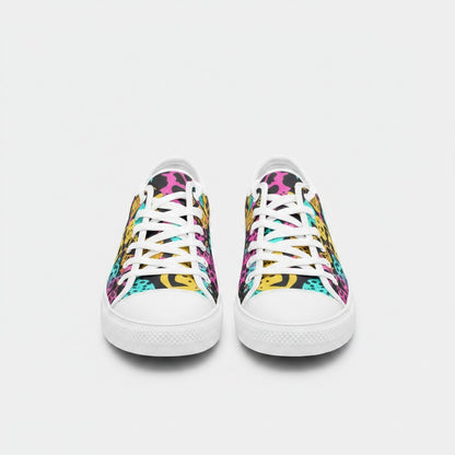 Freaky Shoes® high-top canvas sneakers featuring a vibrant, multi-colored animal print pattern and white laces.