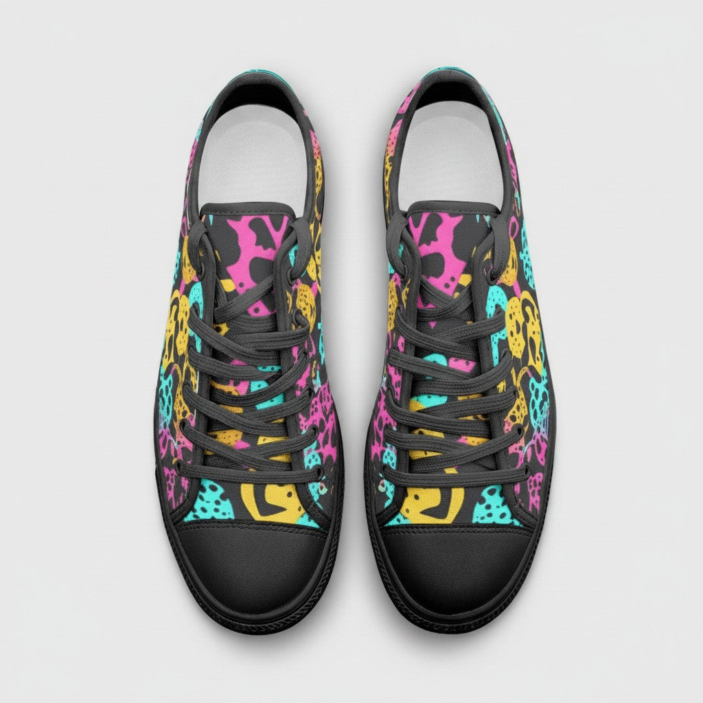 Freaky Shoes® high-top canvas sneakers featuring a vibrant, multi-colored animal print pattern with black laces.
