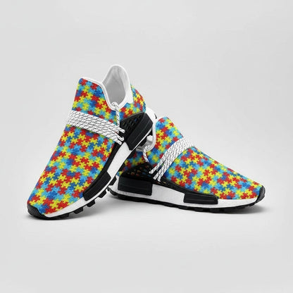 Freaky Shoes® custom high-top canvas sneakers featuring a vibrant, multi-coloured autism awareness puzzle piece print.