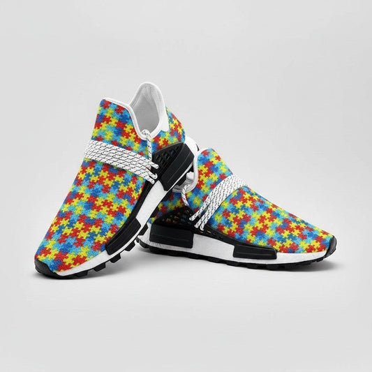 Freaky Shoes® custom high-top canvas sneakers featuring a vibrant, multi-coloured autism awareness puzzle piece print.