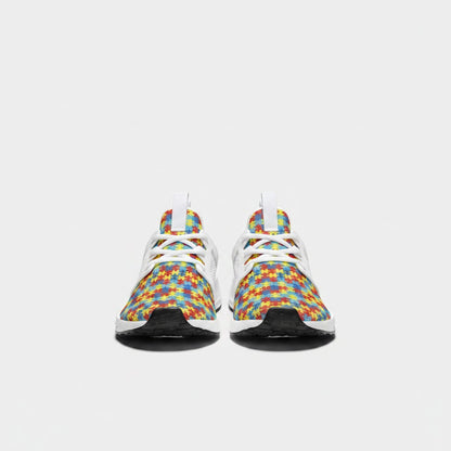Freaky Shoes® high-top canvas sneakers featuring a colorful autism puzzle piece print and white lace-up design.