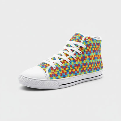 Freaky Shoes® high-top canvas sneakers featuring a colorful autism awareness puzzle piece print and white laces.