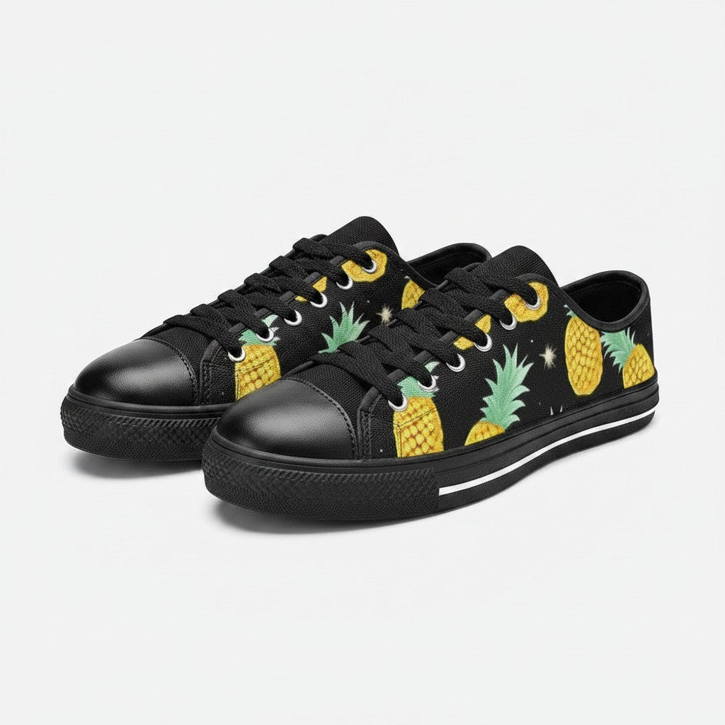 Freaky Shoes® women's black canvas low-top sneakers featuring a yellow pineapple and star pattern.