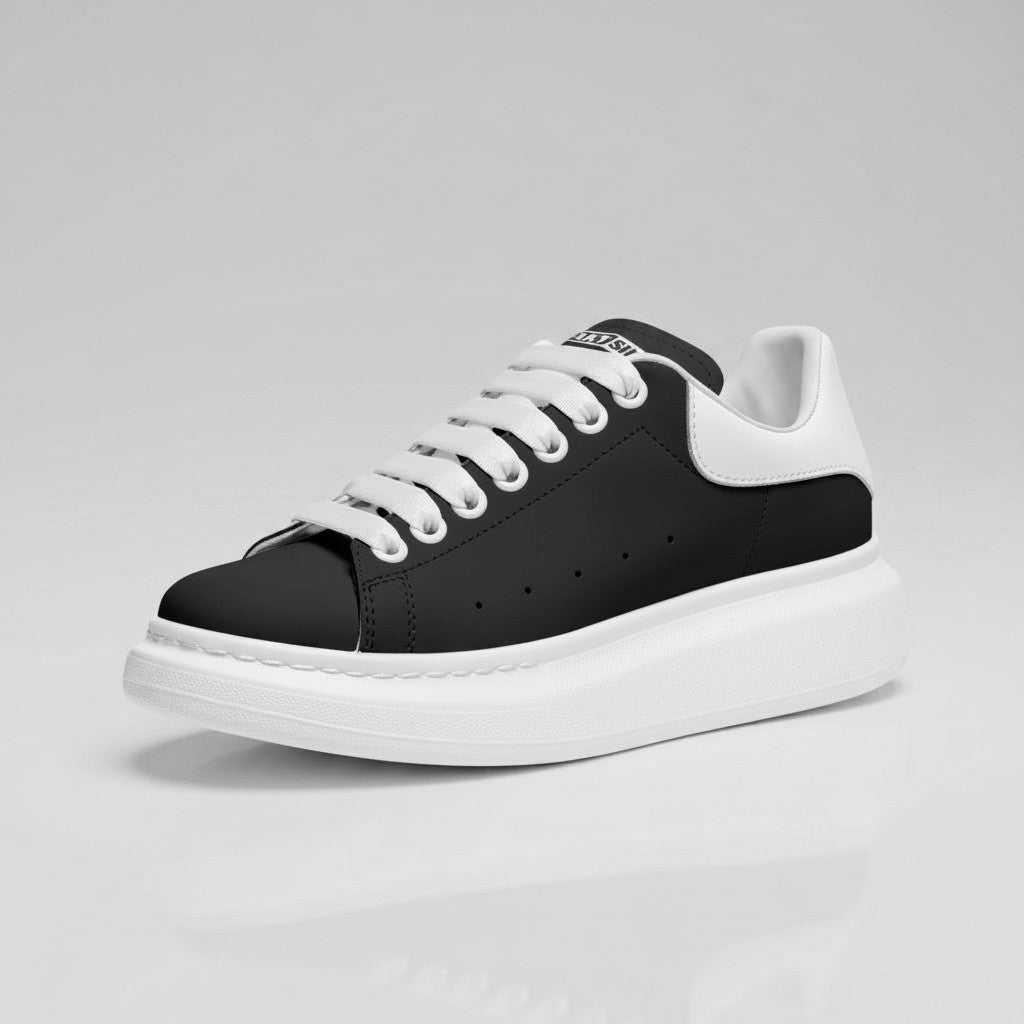 Freaky Shoes® black and white leather lace-up sneakers with a thick platform sole and minimalist design.