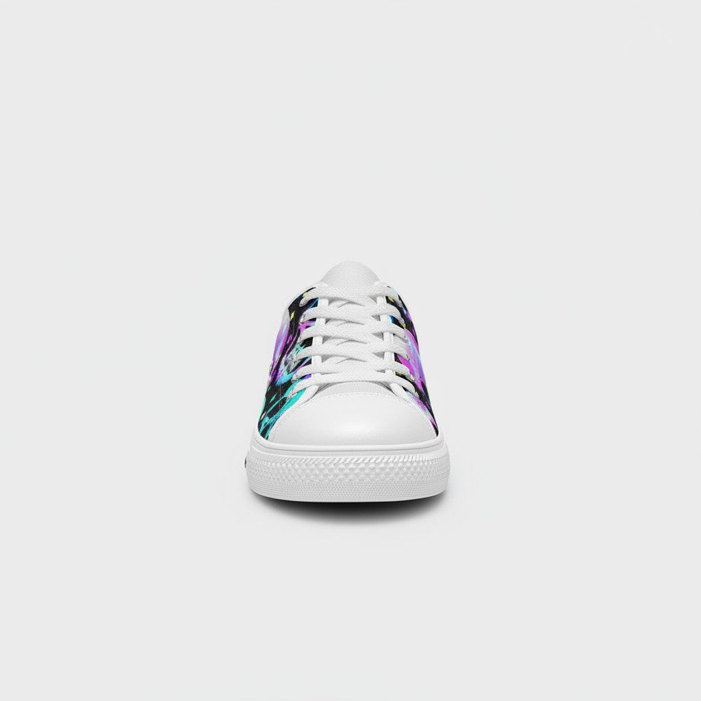 Freaky Shoes® women's canvas sneakers featuring a vibrant multi-colored skull print with white laces and toe cap.