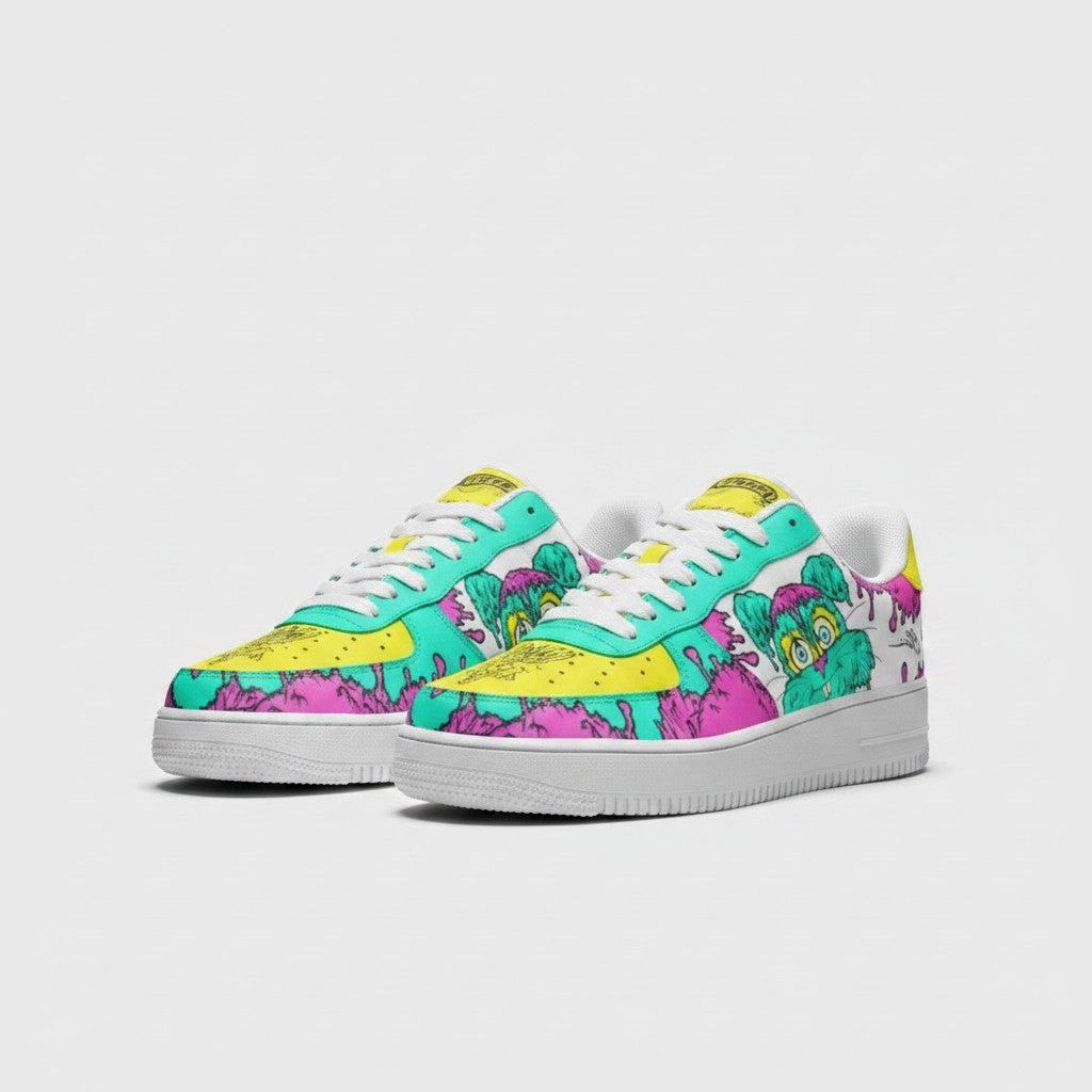 Freaky Shoes® low-top leather sneakers featuring a vibrant cake frosted rabbit design in neon pink, teal, and yellow.