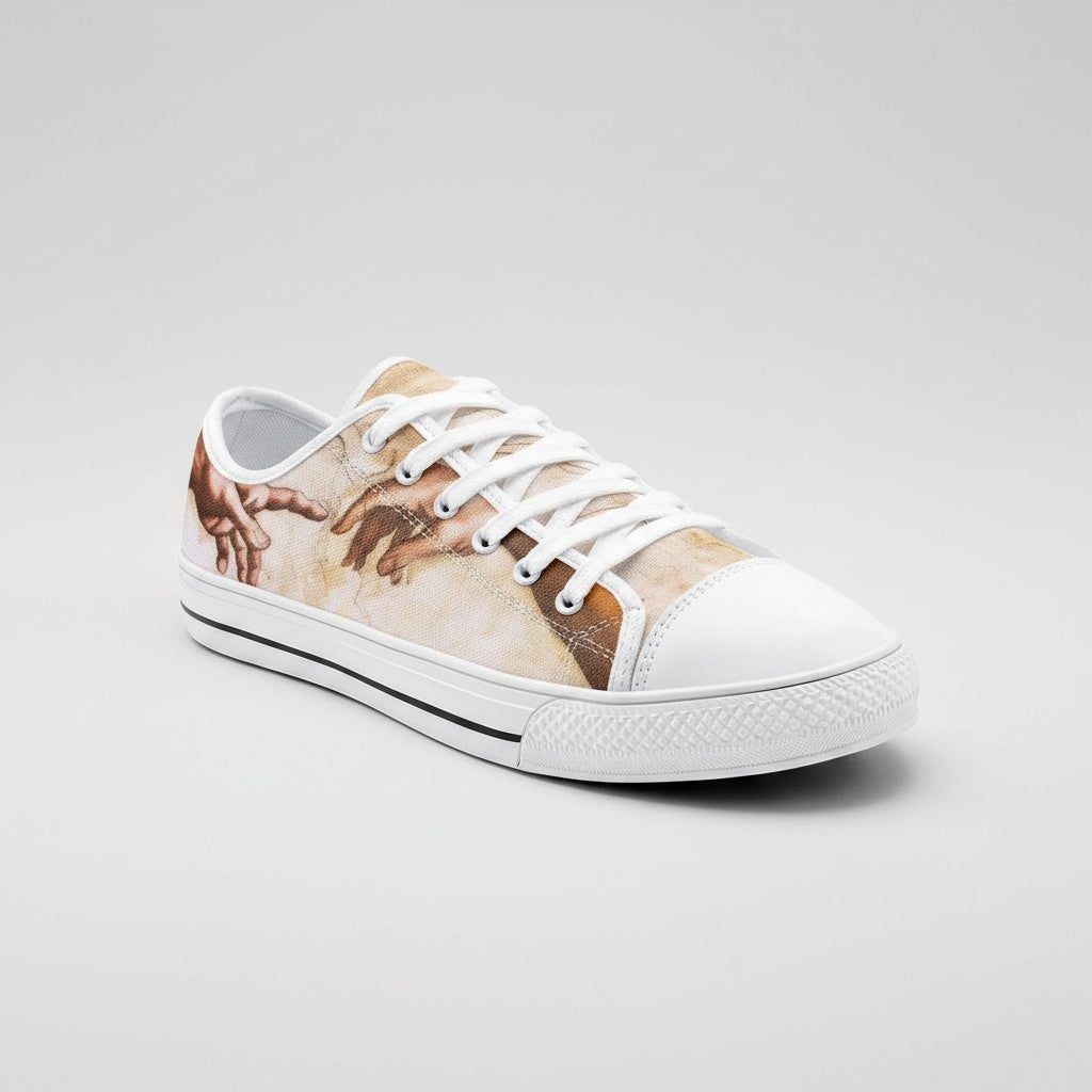Freaky Shoes® low-top canvas sneakers featuring The Creation of Adam art print with white laces and rubber toe cap.