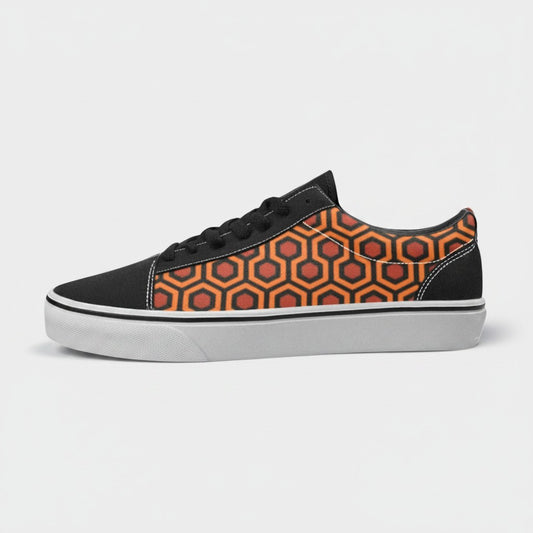Freaky Shoes® women's low-top canvas skate shoes featuring an orange and black geometric carpet pattern design.