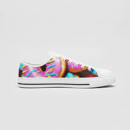 Freaky Shoes® women's low-top canvas sneakers featuring a colorful donut art print with pink frosting and sprinkles.