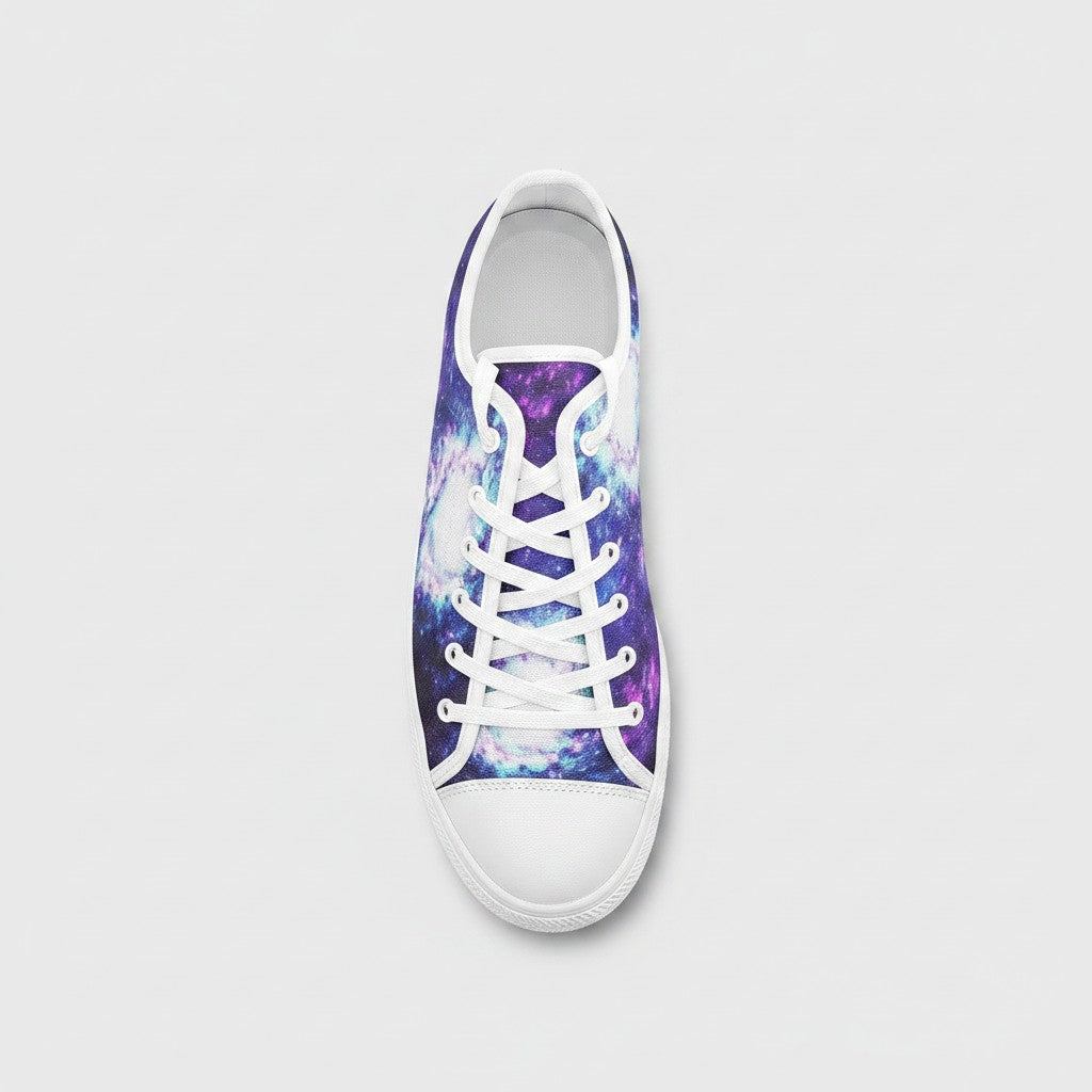 Freaky Shoes® low-top canvas sneakers featuring a vibrant purple and blue galaxy art print with white laces.