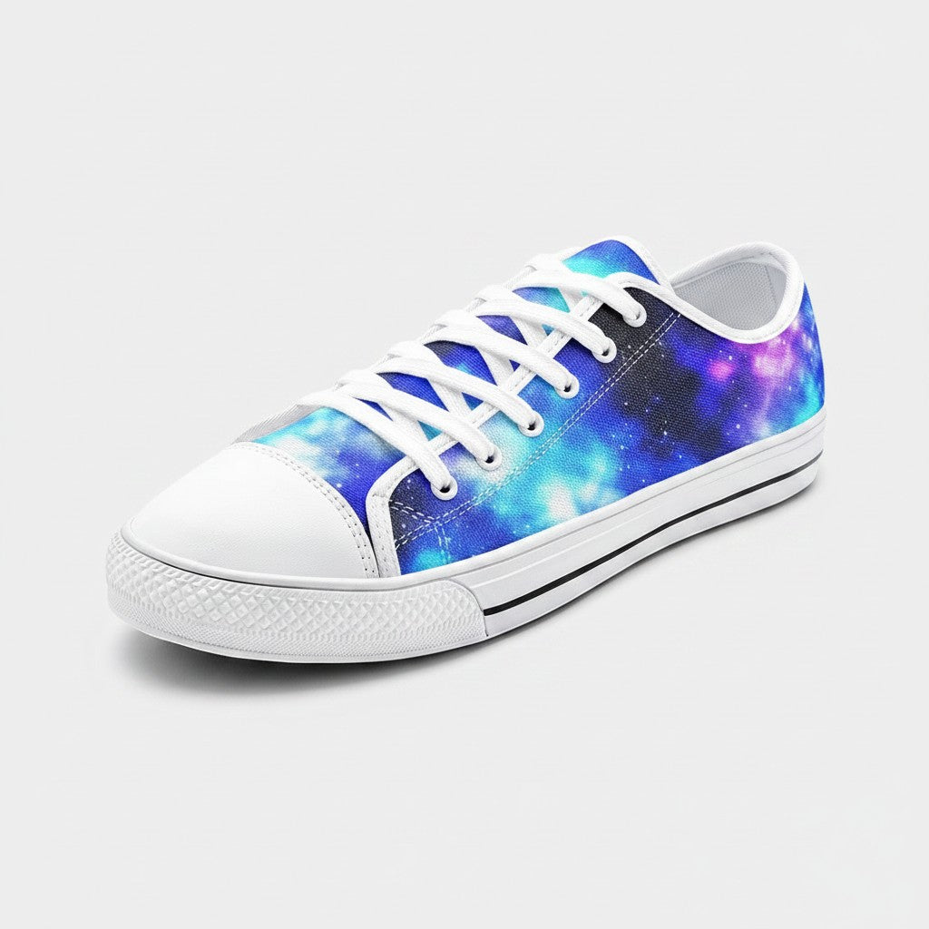 Freaky Shoes® low-top canvas sneakers featuring a vibrant blue and purple galaxy print with white laces and toe cap