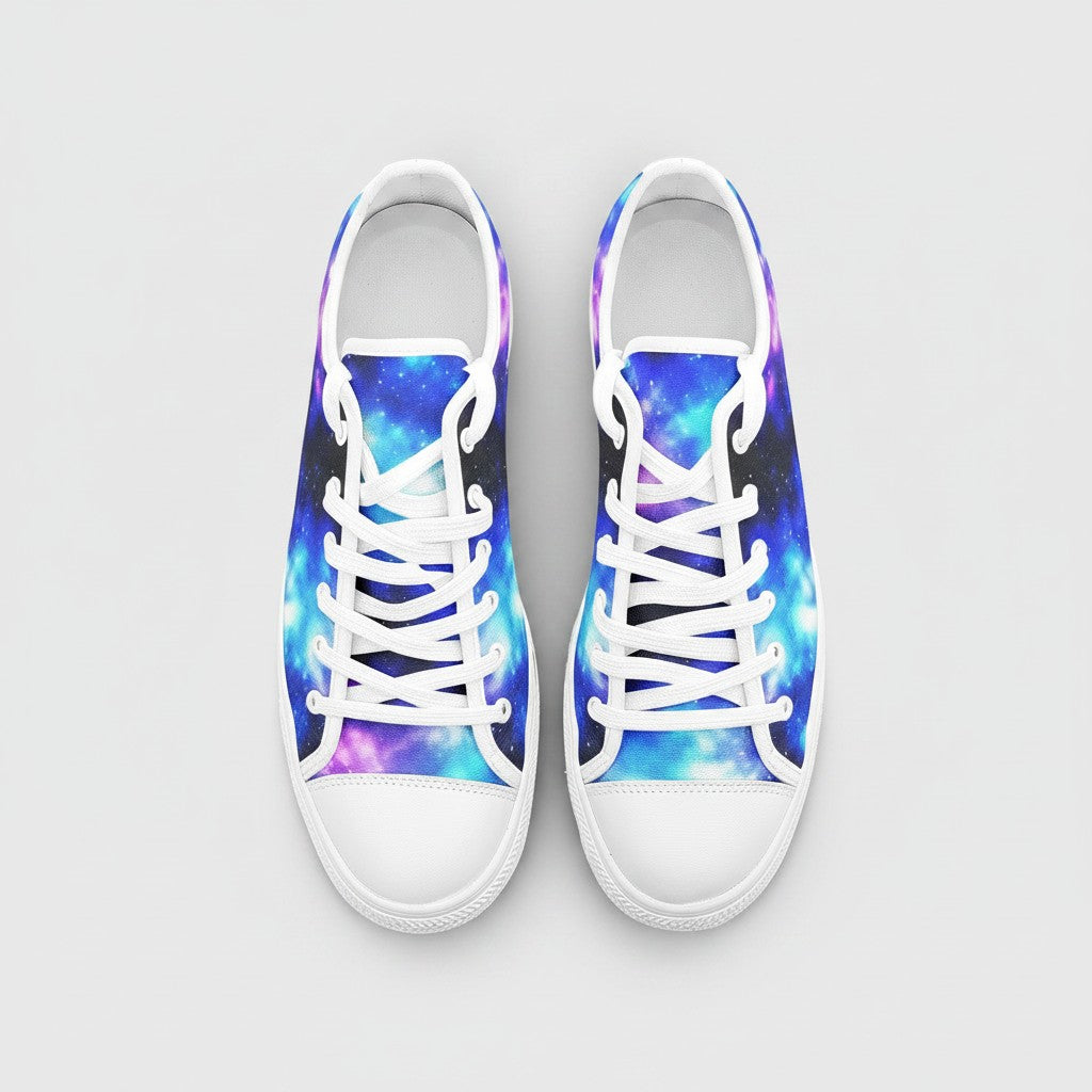 Freaky Shoes® low-top canvas sneakers featuring a vibrant blue and purple galaxy print with white laces and toe caps.