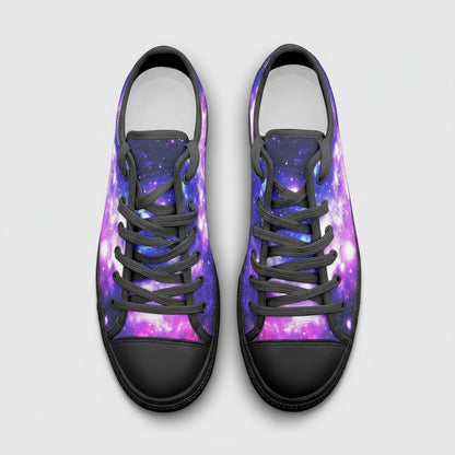 Freaky Shoes® low-top canvas sneakers featuring a vibrant purple and blue galaxy print with black laces and toe caps.