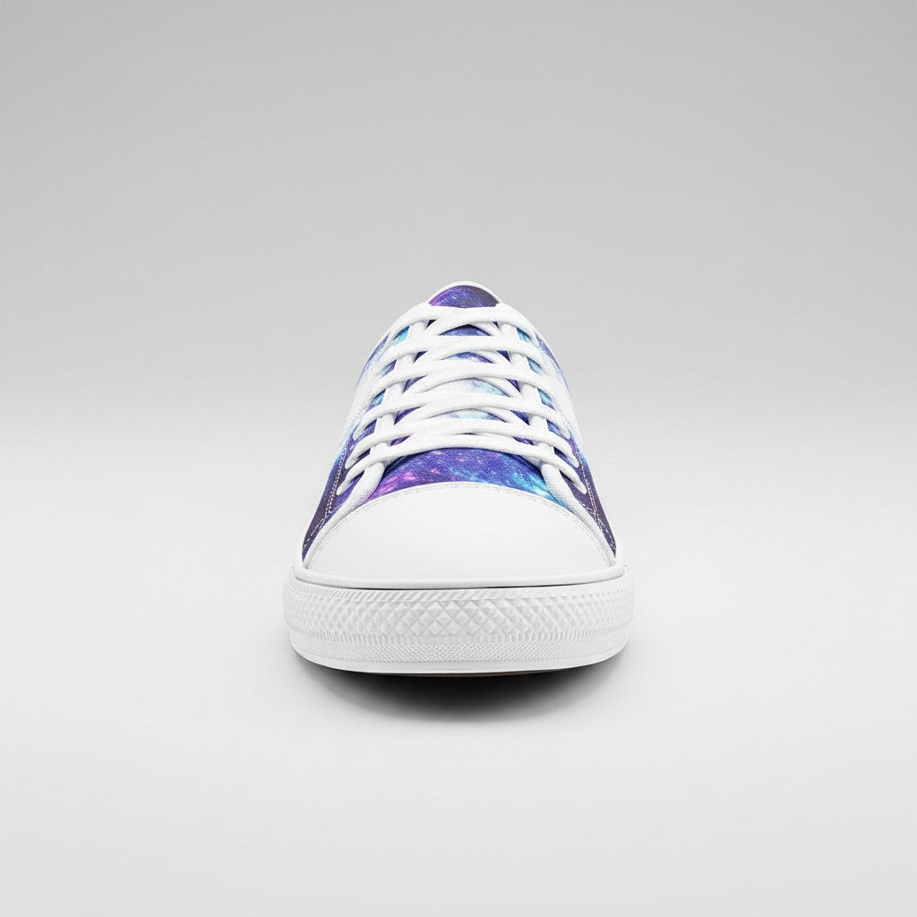 Freaky Shoes® low-top canvas sneakers featuring a vibrant purple and blue galaxy print with white laces and toe cap.