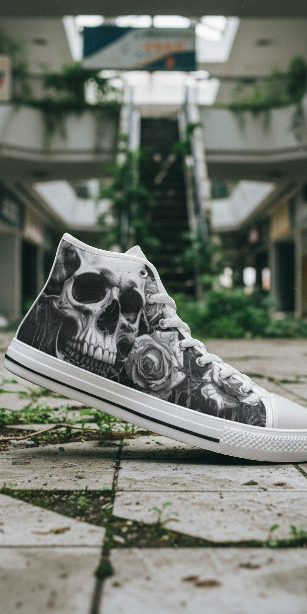 Freaky Shoes® high top canvas sneakers featuring a gothic skull and rose print in grey and black on a tiled floor.