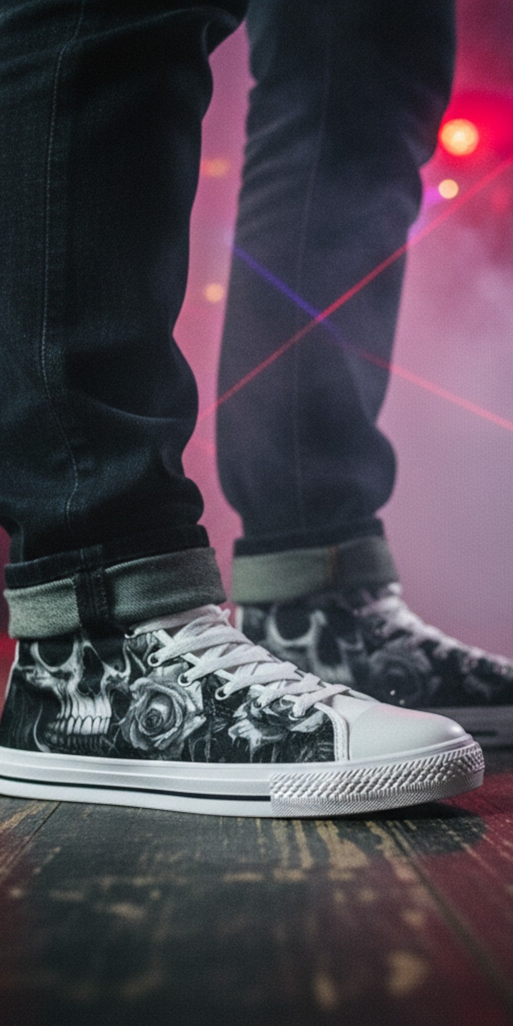 Freaky Shoes® men's high top canvas sneakers with black and white gothic skull and rose art on a stage with lasers.
