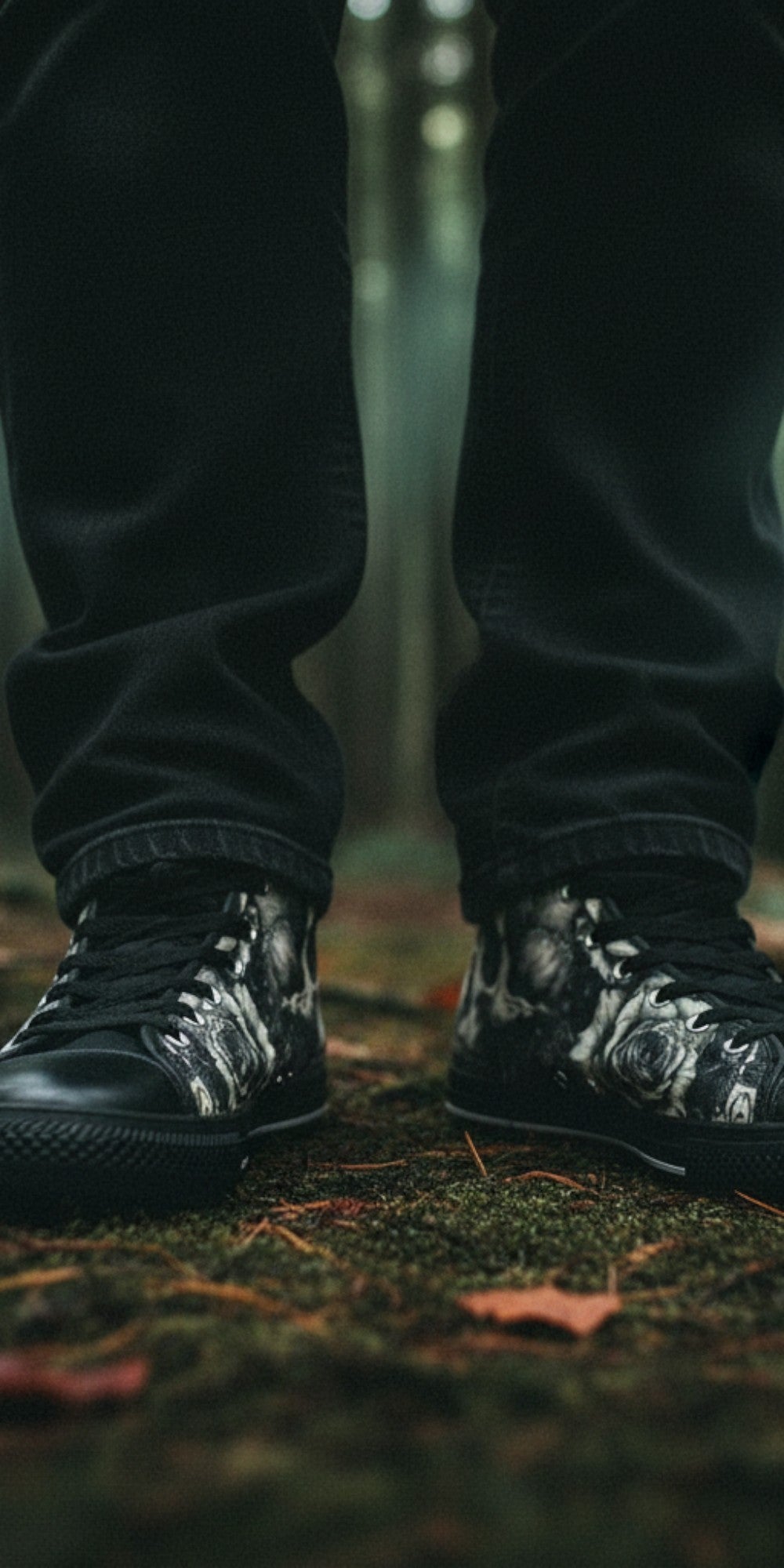 Freaky Shoes® gothic skull and rose print high top canvas sneakers worn in a dark forest setting.