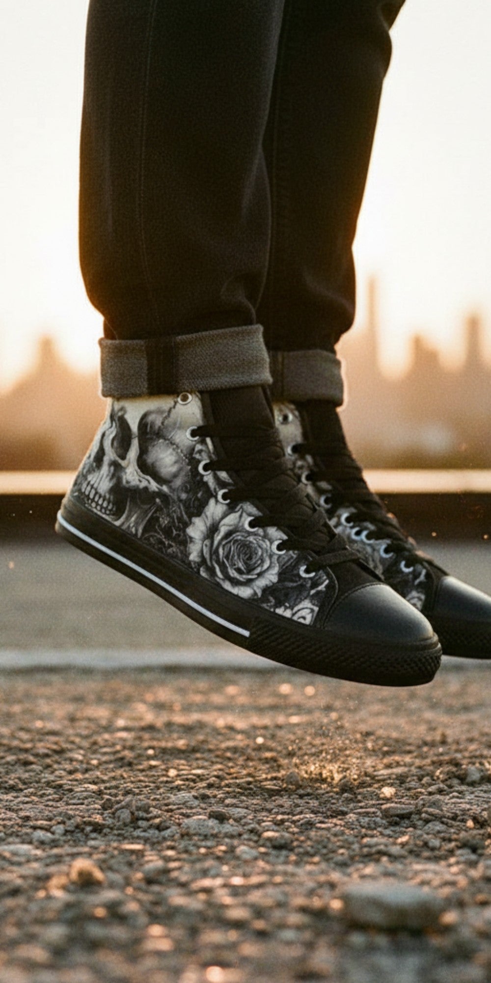 Freaky Shoes® gothic high top canvas sneakers with skull and rose print, worn by a person jumping at sunset.