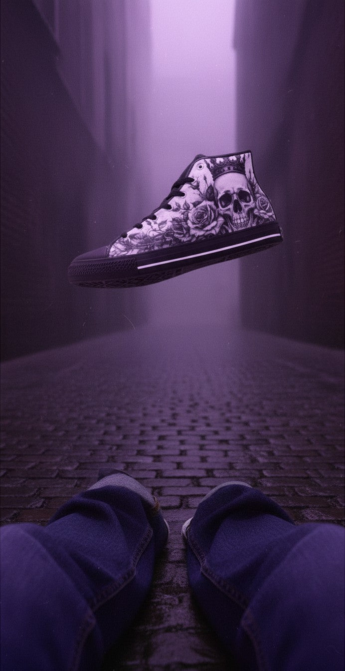 Freaky Shoes® gothic high top canvas sneakers featuring a grey skull and rose print in a moody purple alleyway.