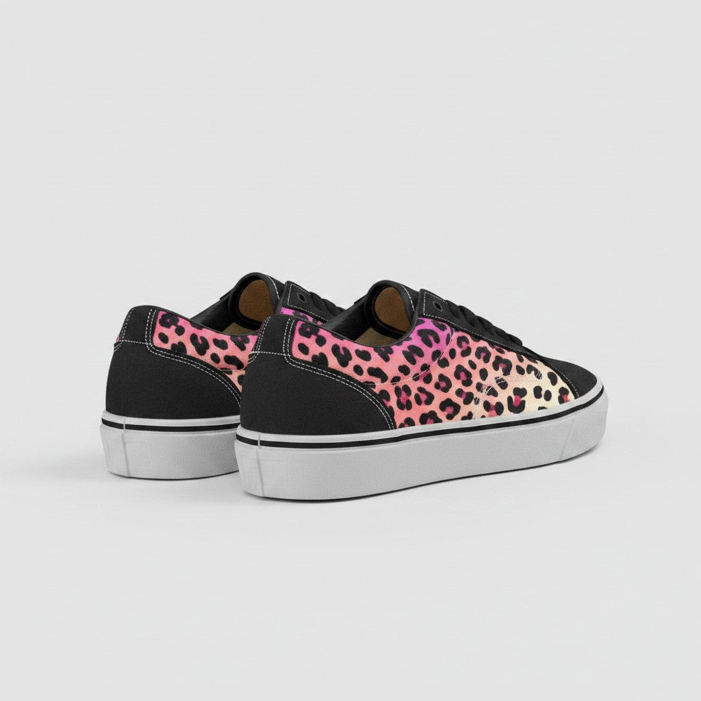 Freaky Shoes® men's low-top canvas skateboarding shoes featuring a pink and orange gradient leopard print design.