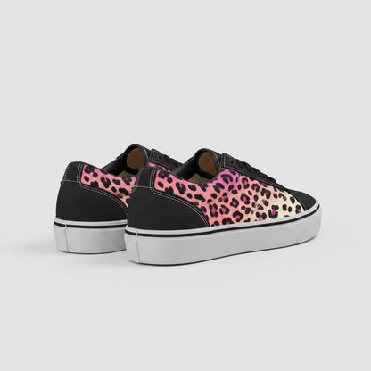 Freaky Shoes® men's low-top canvas skateboarding shoes featuring a pink and orange gradient leopard print design.