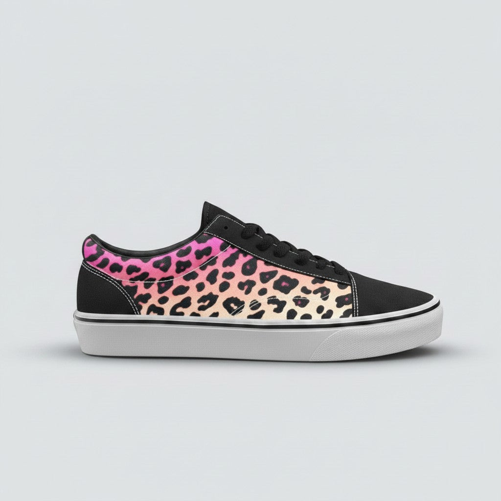 Freaky Shoes® men's low-top canvas skateboarding sneakers featuring a pink and orange gradient leopard print design.