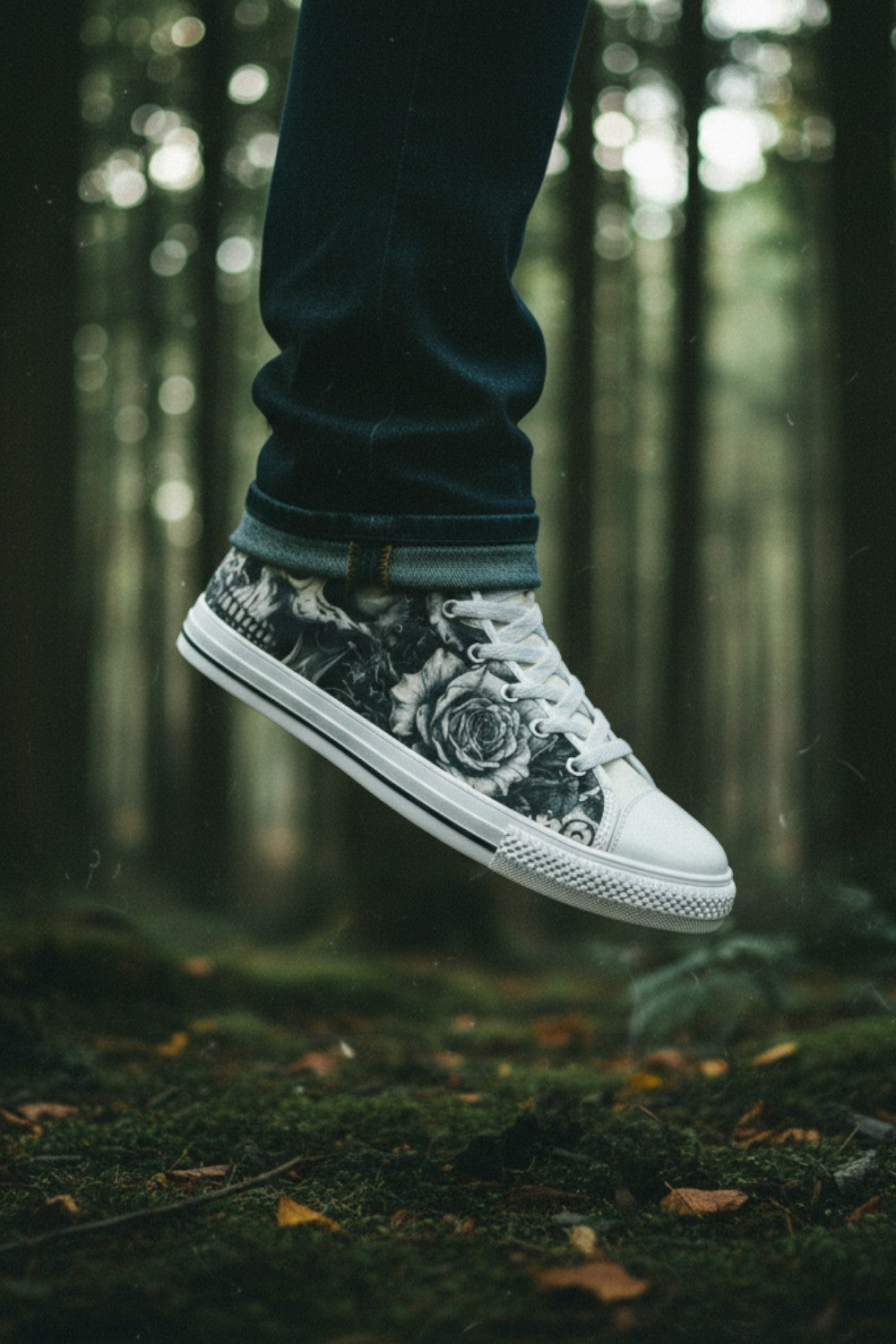 Freaky Shoes® grey rose and skull print high top canvas sneakers worn in a moody forest setting.
