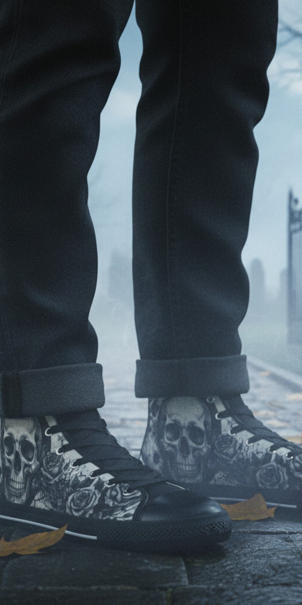 Freaky Shoes® grey skull and moon gothic canvas high top sneakers worn with black jeans in a misty cemetery setting.
