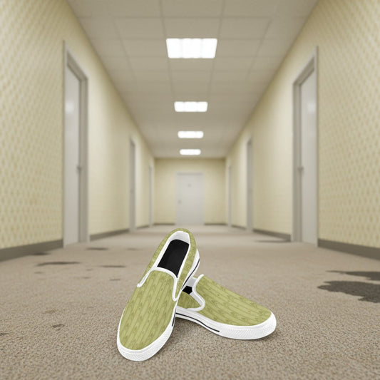 Freaky Shoes® kids' slip-on canvas sneakers in light green with a geometric pattern. Features white rubber soles and elastic side panels.