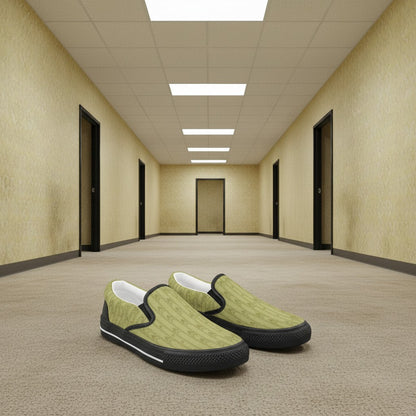 Freaky Shoes® kids' slip-on canvas sneakers in light olive green with a geometric pattern. Features black trim and rubber soles.
