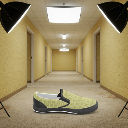 Freaky Shoes® kids' slip-on canvas sneakers in light yellow with a geometric pattern and black accents.