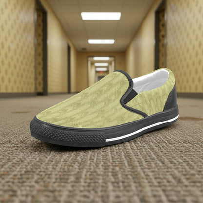 Freaky Shoes® kids' slip-on canvas sneakers in light green with a subtle geometric pattern and black trim.
