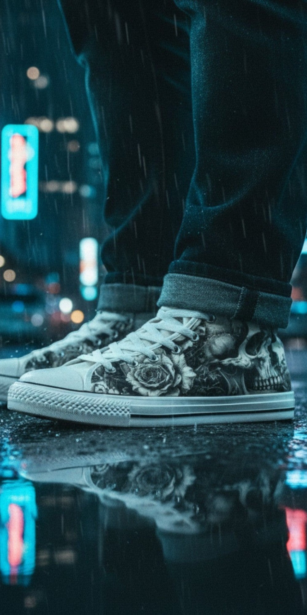 Freaky Shoes® monochrome skull and rose canvas high top sneakers worn in a rainy city street at night.