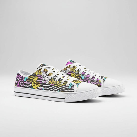 Freaky Shoes® neon animal print low-top canvas sneakers with white rubber toe caps and lace-up closure.