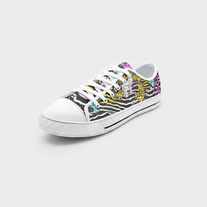 Freaky Shoes® neon animal print canvas low-top sneakers with white rubber toe cap and lace-up closure.