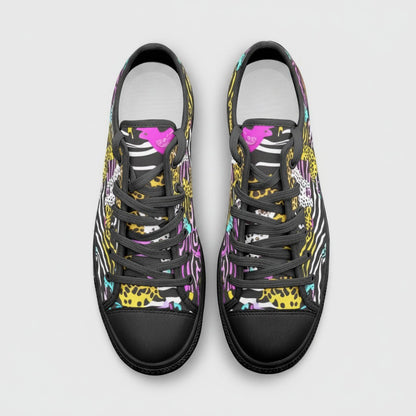 Freaky Shoes® neon animal print high-top canvas sneakers with black laces and rubber toe caps, top-down view.