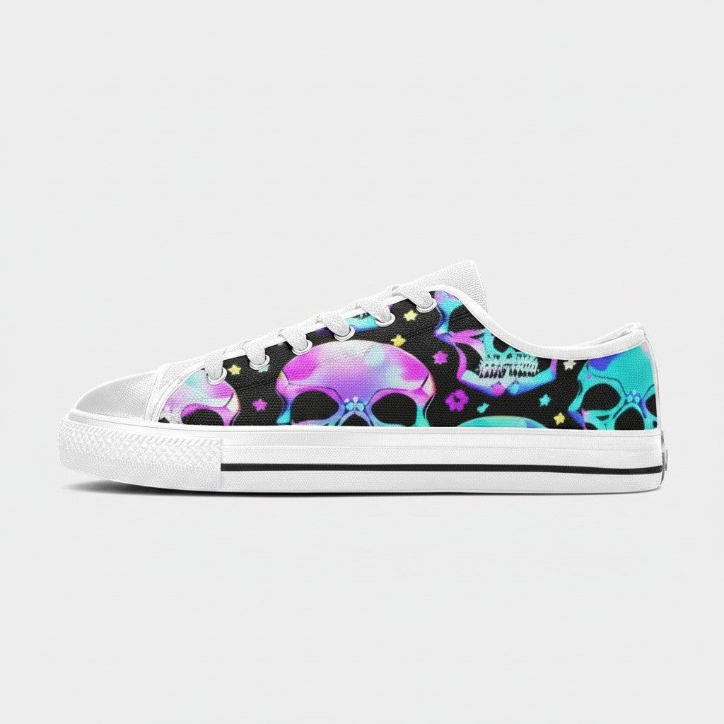 Freaky Shoes® women's canvas low-top sneakers featuring a vibrant neon skull pattern on a black background.