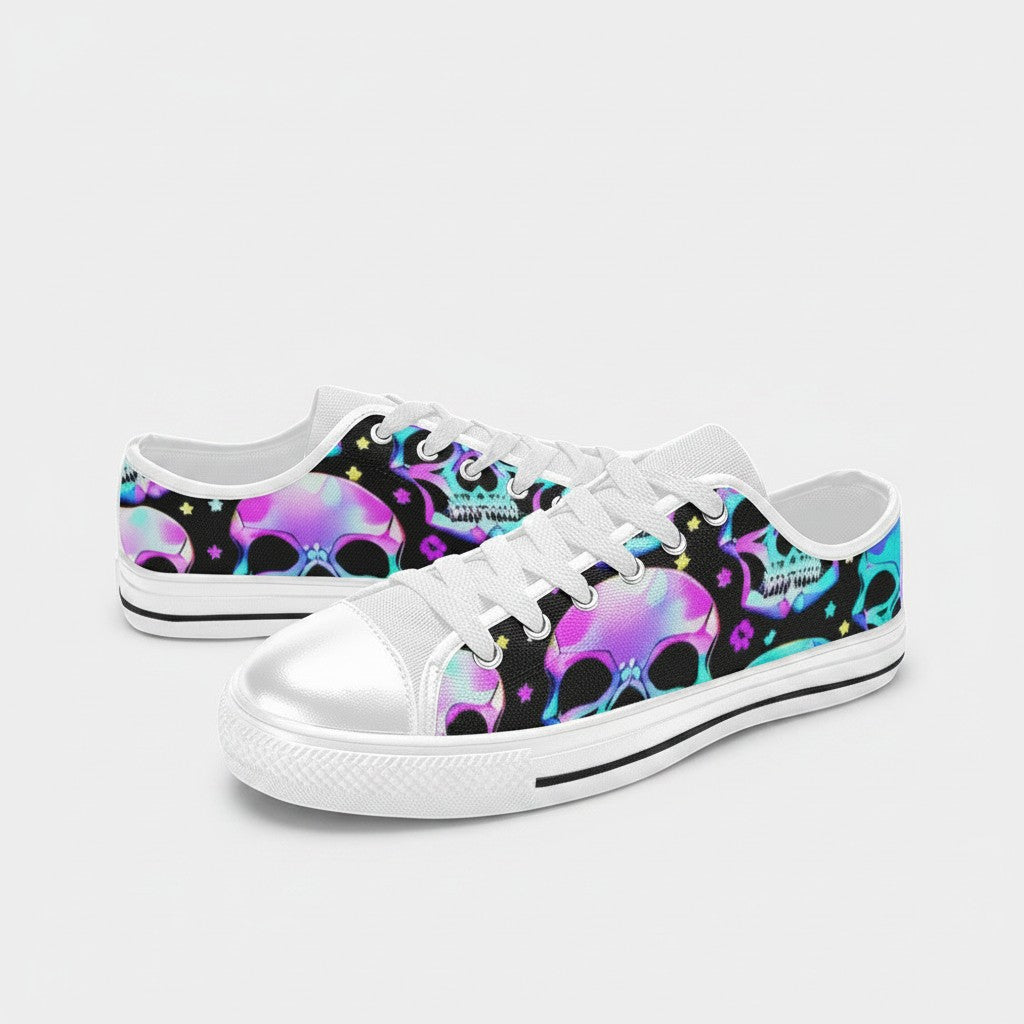 Freaky Shoes® women's low-top canvas sneakers featuring a vibrant neon skull pattern on a black background.
