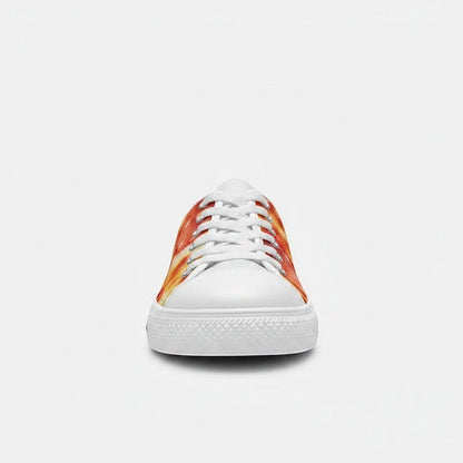 Freaky Shoes® women's low-top canvas sneakers featuring a vibrant pepperoni pizza cheese print and white rubber toe.