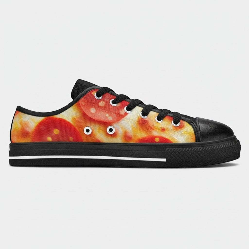 Freaky Shoes® women's low-top canvas sneakers featuring a vibrant pepperoni pizza cheese print and black trim.
