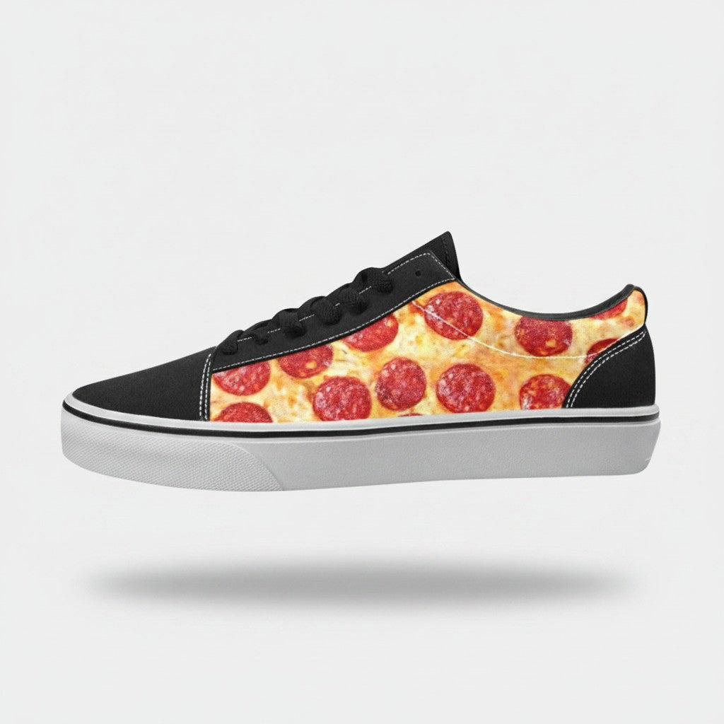 Freaky Shoes® women's low-top canvas skateboarding sneakers featuring a pepperoni pizza print and black trim.