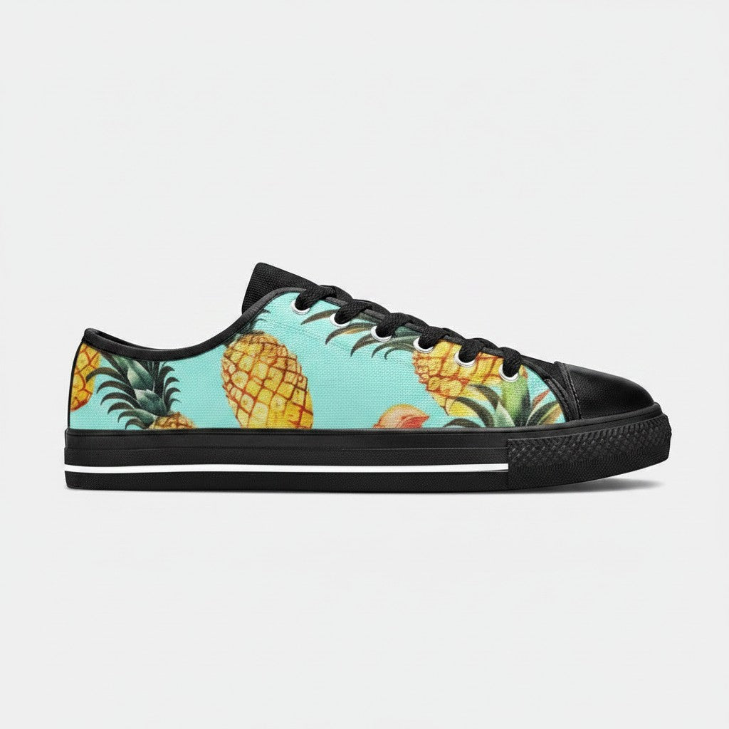 Freaky Shoes® women's low-top canvas sneakers featuring a vibrant pineapple print on a light blue background