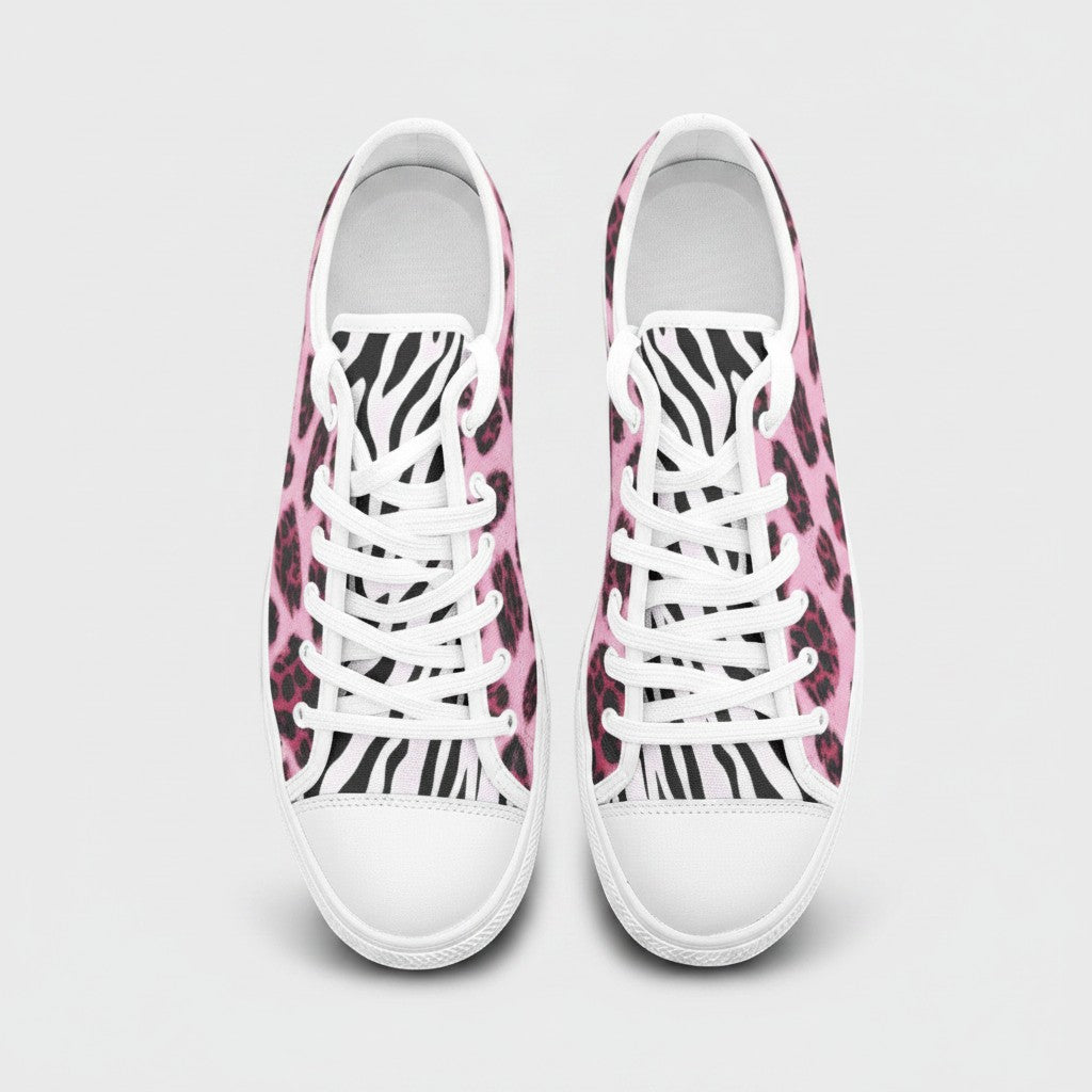 Freaky Shoes® low-top canvas sneakers featuring a vibrant pink leopard and black zebra animal print pattern.