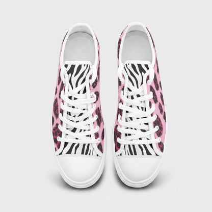 Freaky Shoes® low-top canvas sneakers featuring a vibrant pink leopard and black zebra animal print pattern.