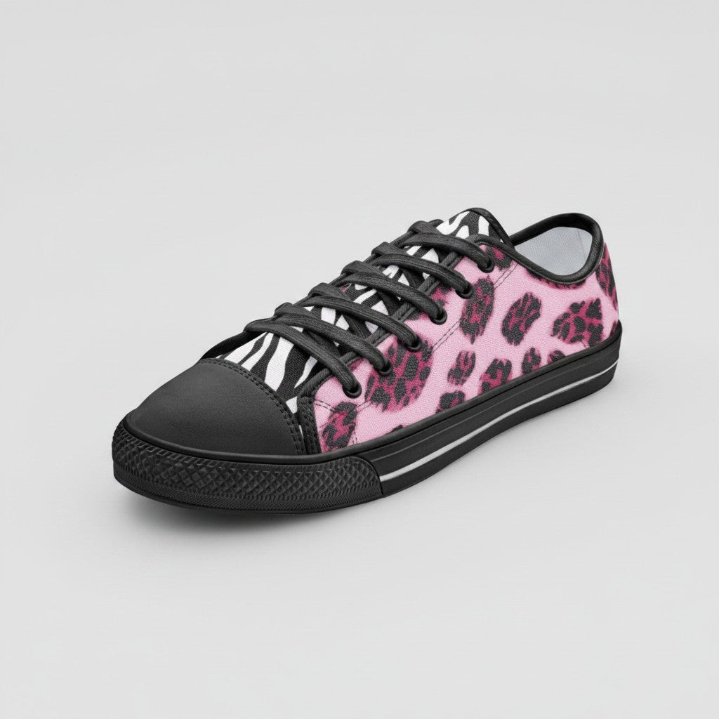 Freaky Shoes® low-top canvas sneakers featuring a vibrant pink and black animal print with zebra and leopard patterns.