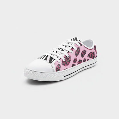 Freaky Shoes® low-top canvas sneakers featuring a vibrant pink and black animal print pattern with white laces.